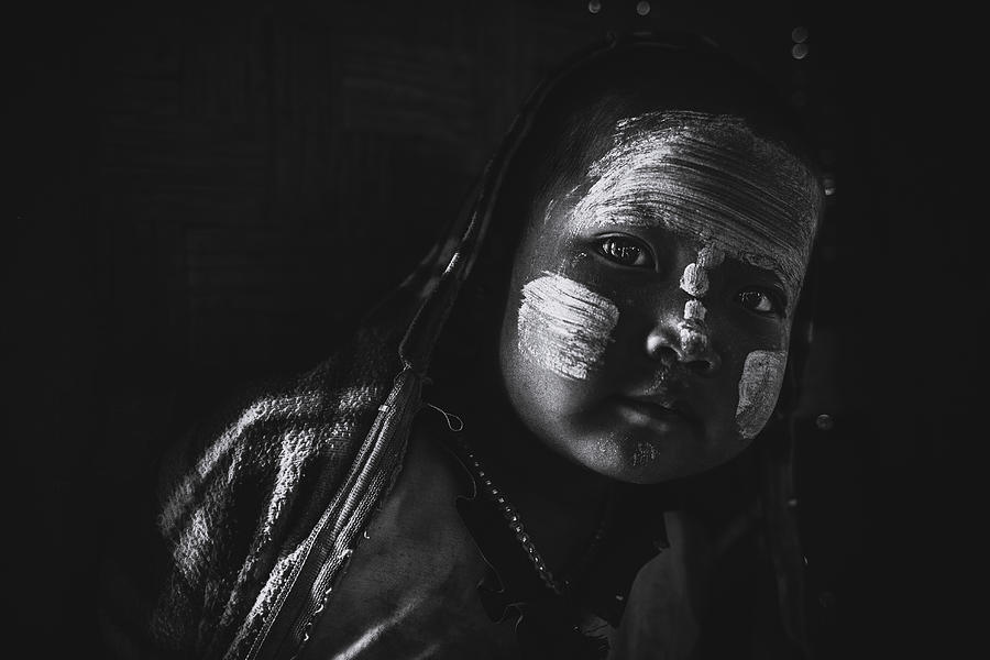 Portrait Photograph - Young Eyes In The Darkness by Marco Tagliarino
