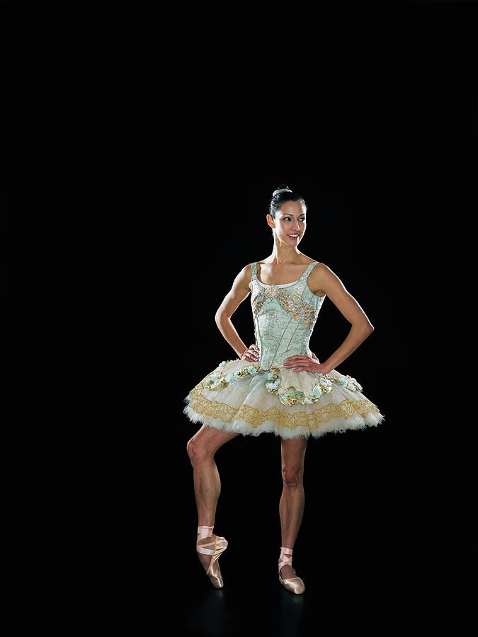 Young Female Ballerina Standing With Photograph by Thomas Barwick