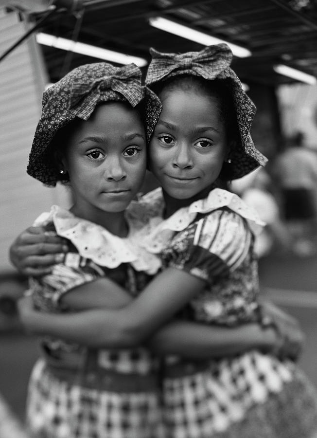 Young Female Twins Hugging Each Other Photograph by Dreampictures ...