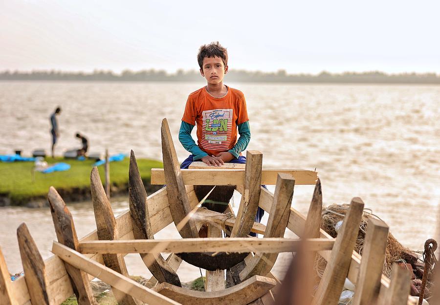 Young Fishing Boat Maker Photograph by Mostafijur Rahman Nasim