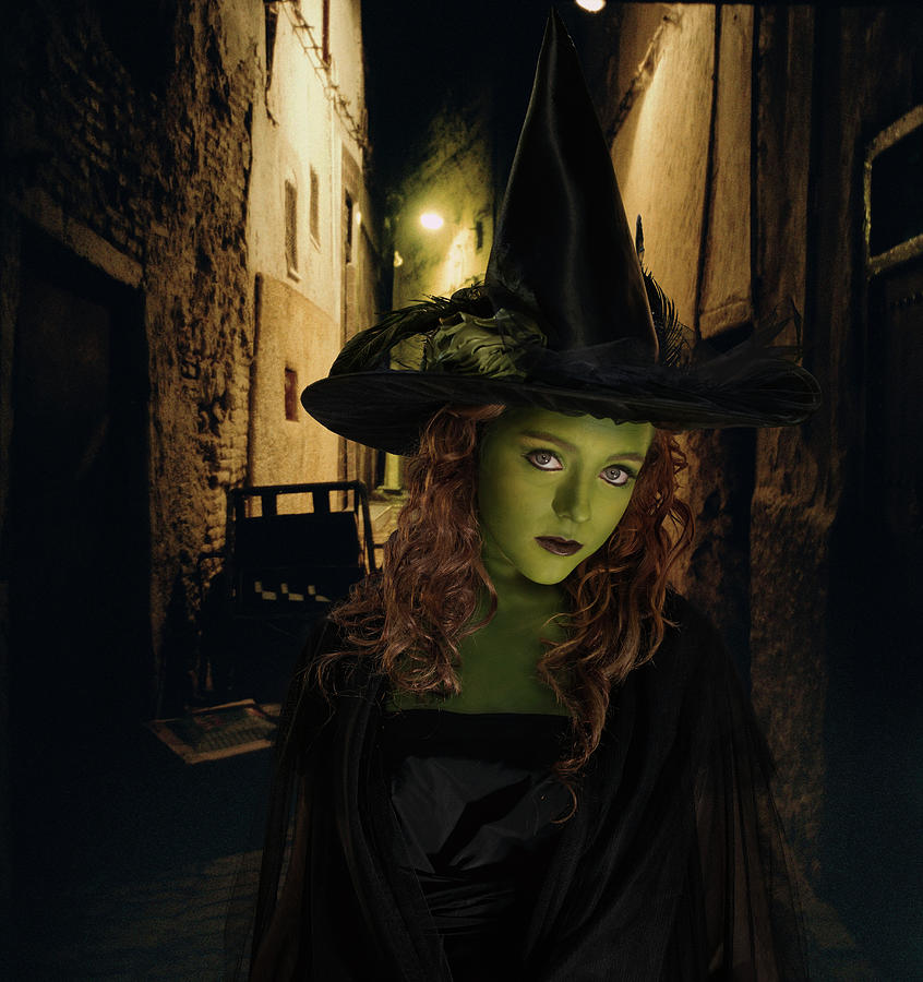 Young Girl Dressed As Witch Standing Photograph by Dreampictures | Fine ...