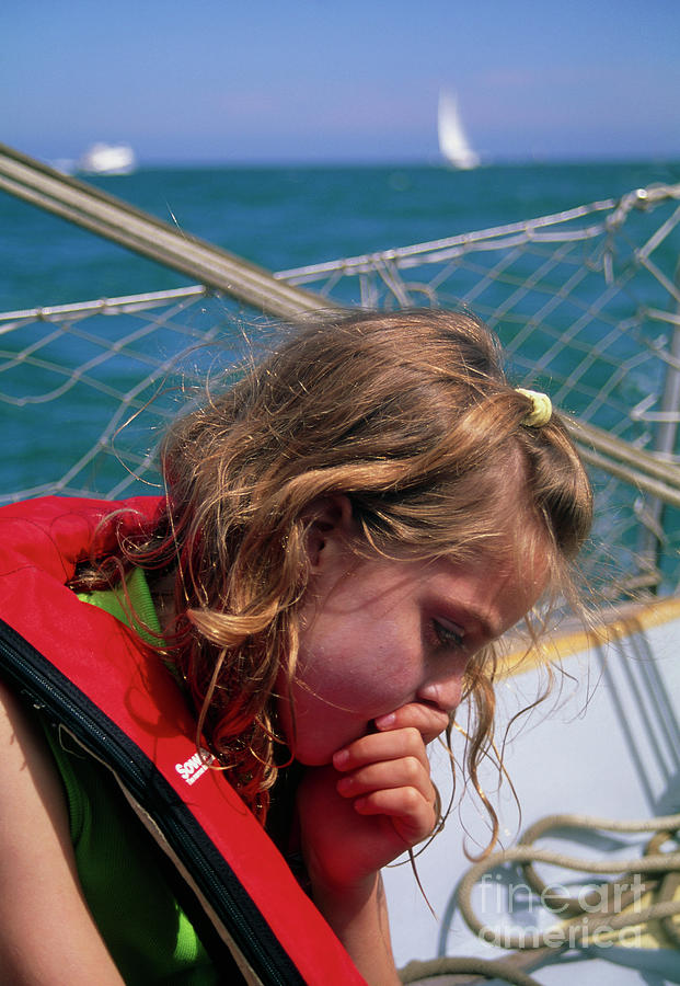 Young Girl Suffering From Seasickness In A Boat Photograph by Mark ...