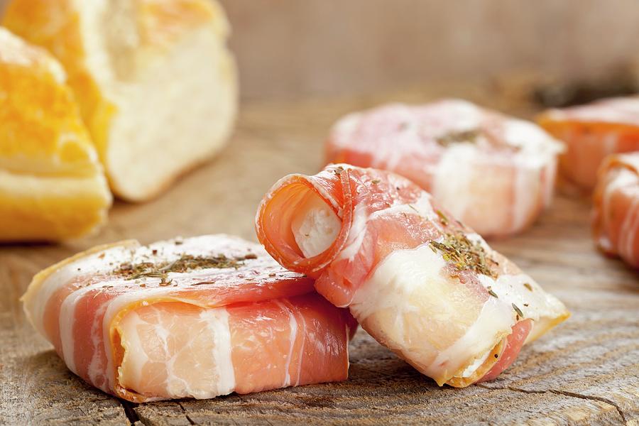 Cheese Photograph - Young Goats Cheese Wrapped In Bacon With Herbes De Provence by Shawn Hempel