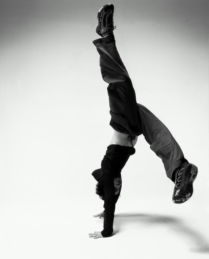 Young Japanese Man Breakdancing B&w by Karen Moskowitz