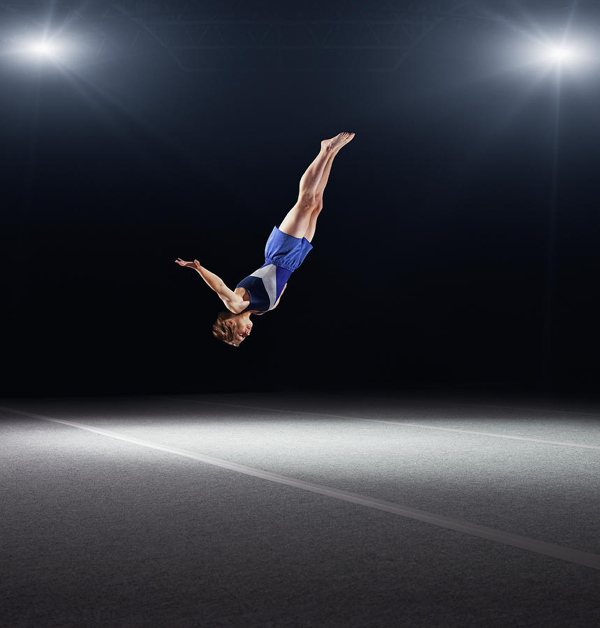 Young Male Gymnast Performing Floor Photograph by Robert Decelis Ltd