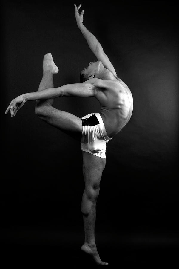 Young Male In Dancer Pose Photograph by Michael Rowe