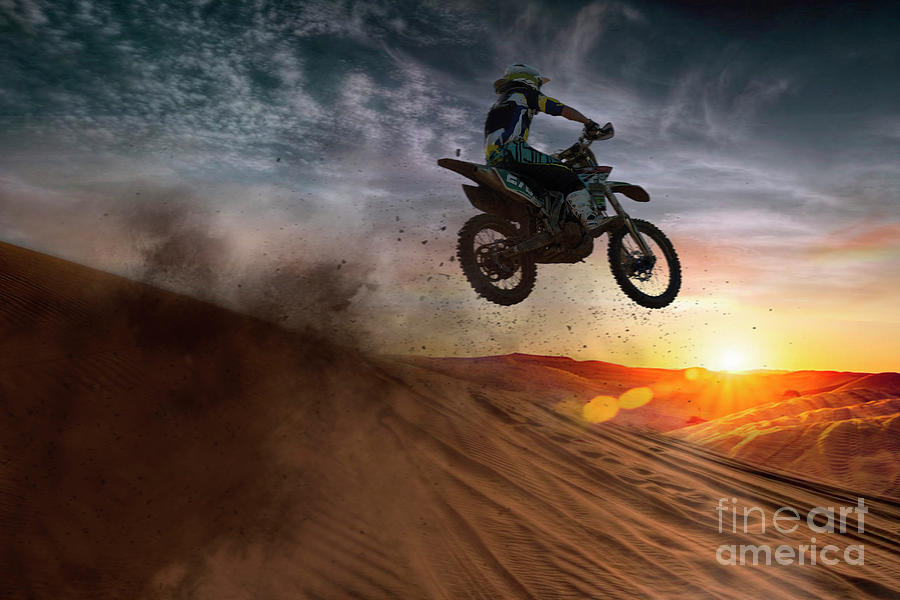 Young Male Motocross Racer Jumping Mid Photograph by Zero Creatives
