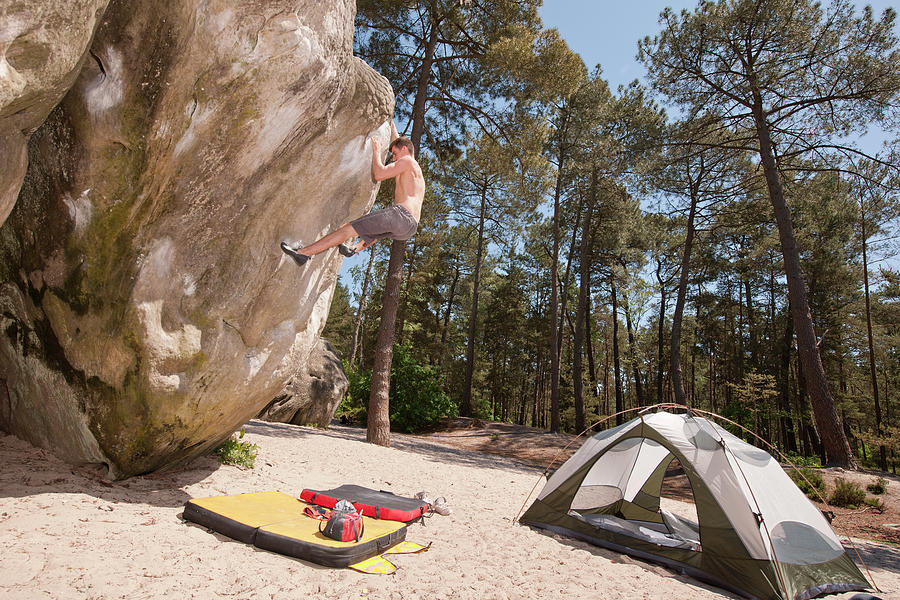 Young Man Bouldering In The Forest Of Fontainebleau Close To Paris Photograph by Cavan Images Young Man Bouldering In The Forest Of Fontainebleau Close To Paris Photograph by Cavan Images
