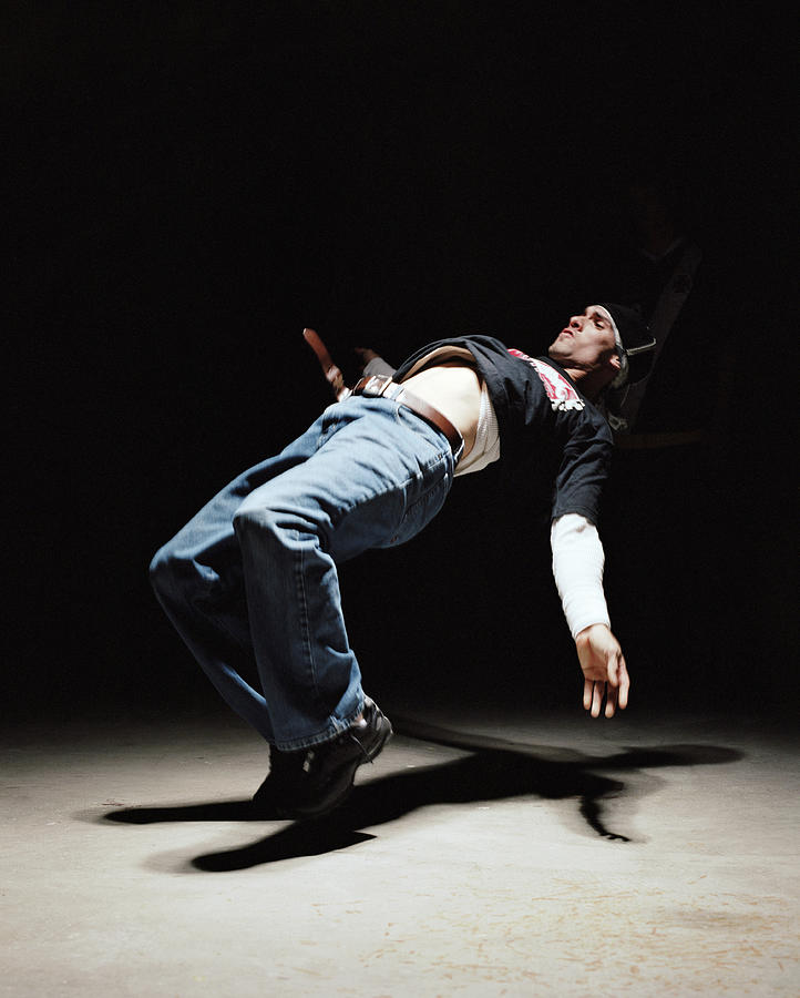 Young Man Breakdancing Photograph by Ryan Mcvay