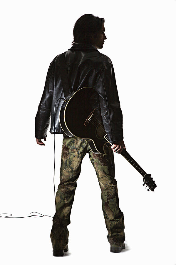 Young Man Holding Guitar, Rear View Photograph by Emmanuel Faure