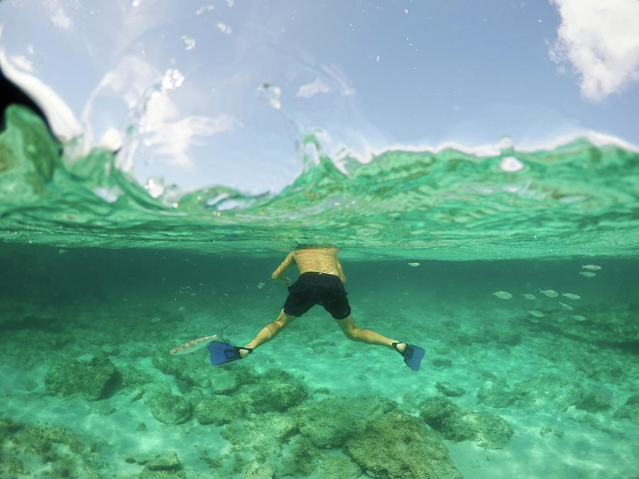 Young Man Snorkeling In Formentera Photograph by Ana del Castillo ...