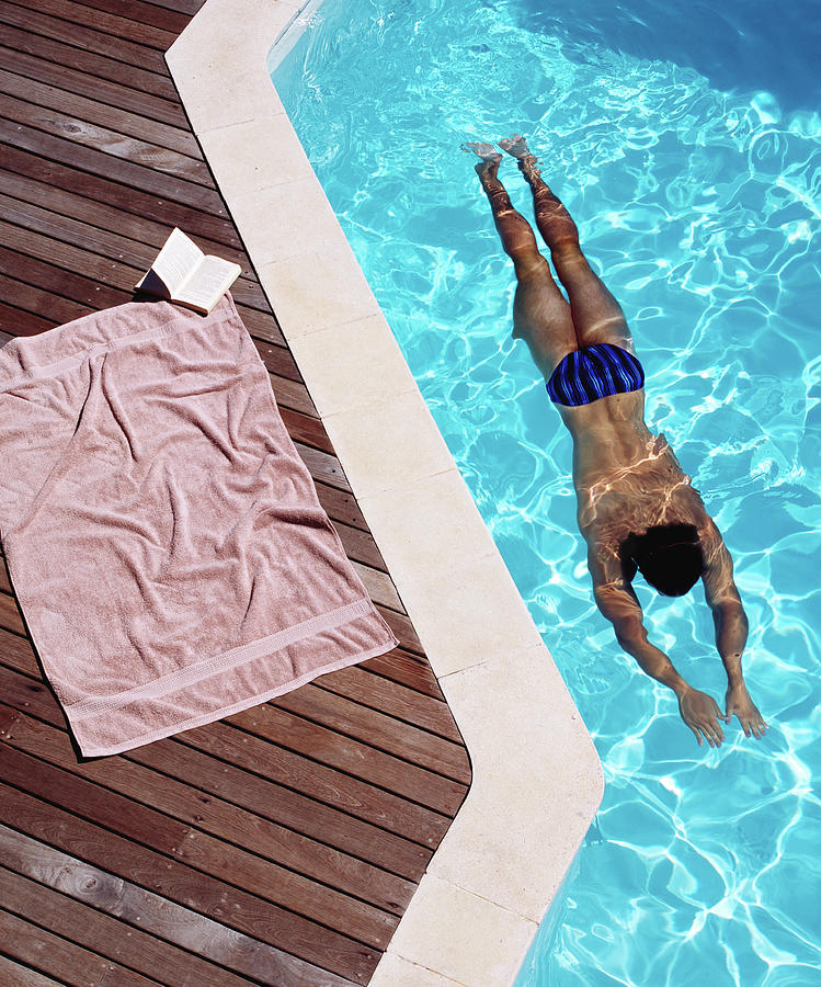 Young Man Swimming, Towel And Book At Photograph by Kelvin Murray Young Man Swimming, Towel And Book At Photograph by Kelvin Murray