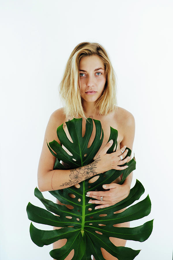 Young Naked Woman Covering Her Body Palm Leaf On White Background  Photograph by Cavan Images - Pixels