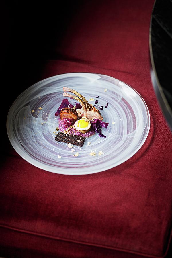Young Piglet With Red Cabbage Risotto At Carte Blanche, Frankfurt Am Main, Germany Photograph by Jalag / Markus Bassler