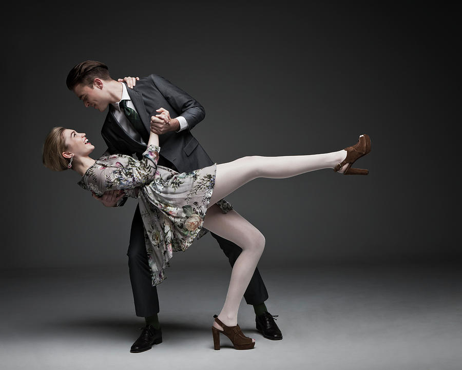 Young Professional Couple Dancing Photograph by Nisian Hughes