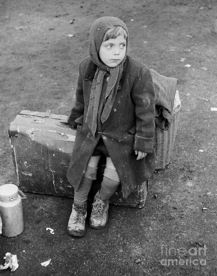 Young Refugee Girl Resting Photograph by Bettmann
