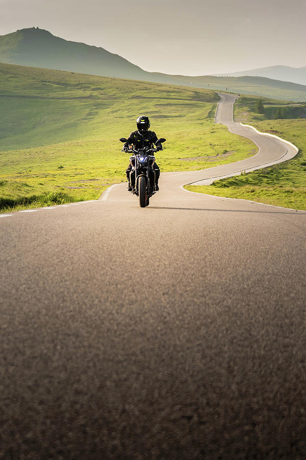 Young Rider Enjoying His Motorcycle On A Free Way Photograph by Cavan ...