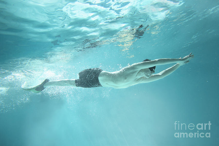 Young Swimmer Without Leg Swimming Photograph by Stanislaw Pytel
