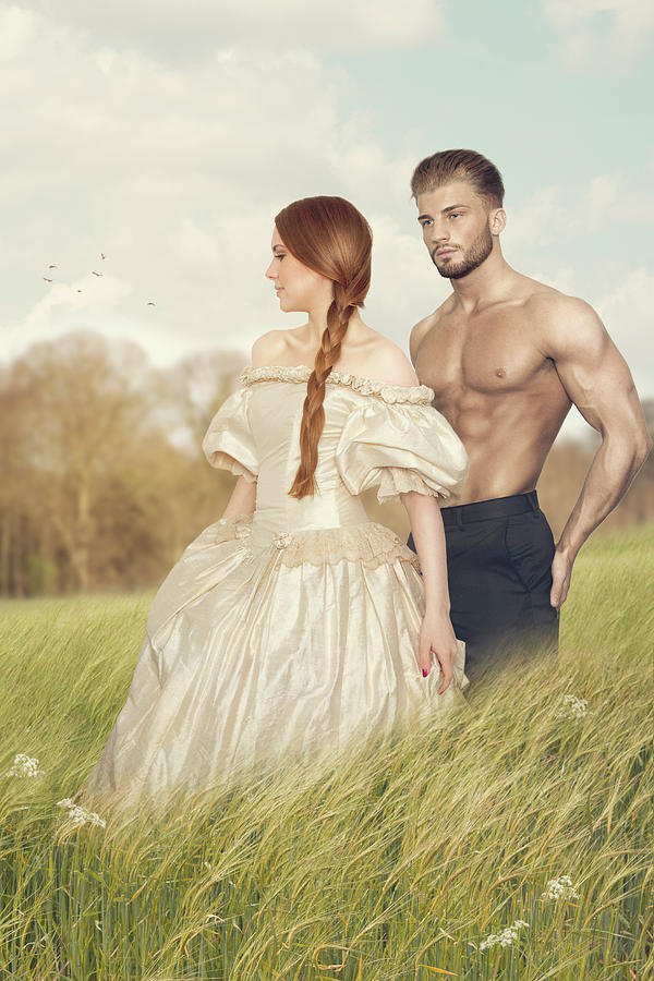 Young Victorian Couple walking Through A Green Meadow Photograph by Ethiriel Photography