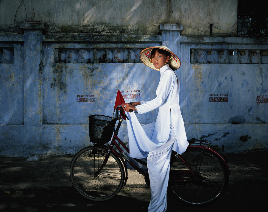 Young Woman Astride Bicycle, Portrait Photograph by Buena Vista Images