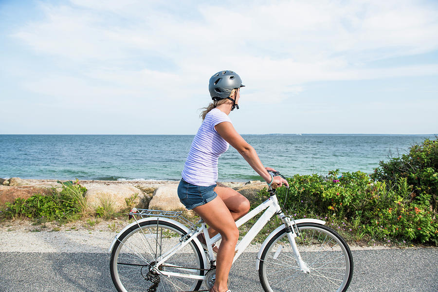 Young Woman Biking By Cape Cod Beaches Coastal Bike Path Photograph by ...