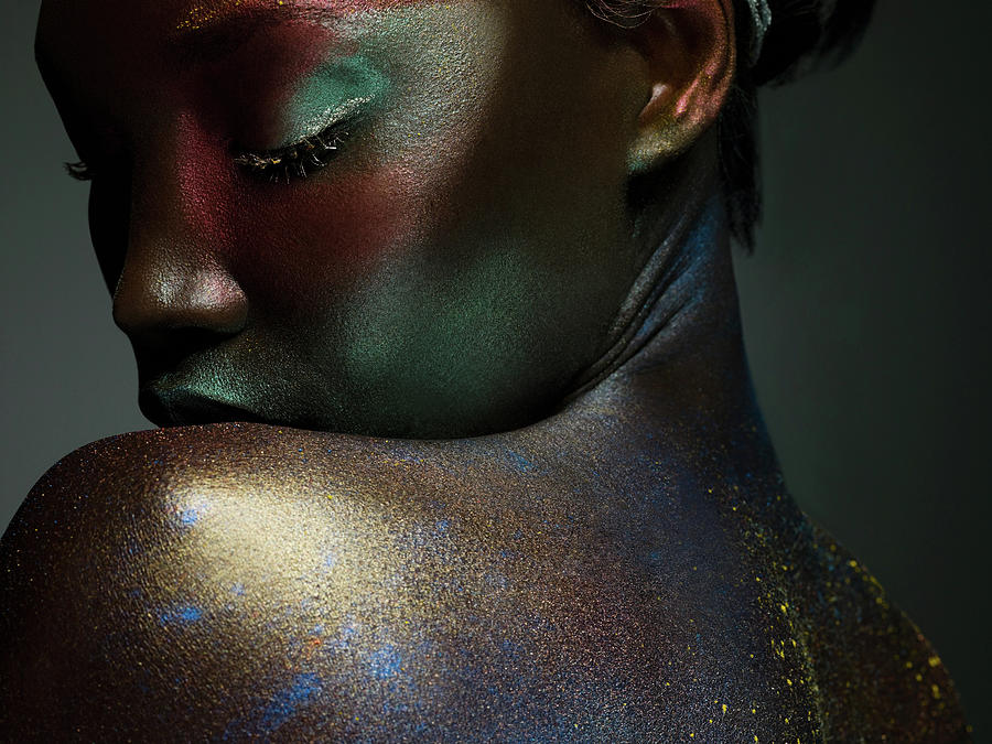 Young Woman Covered In Metallic Make Up Photograph by Image Source