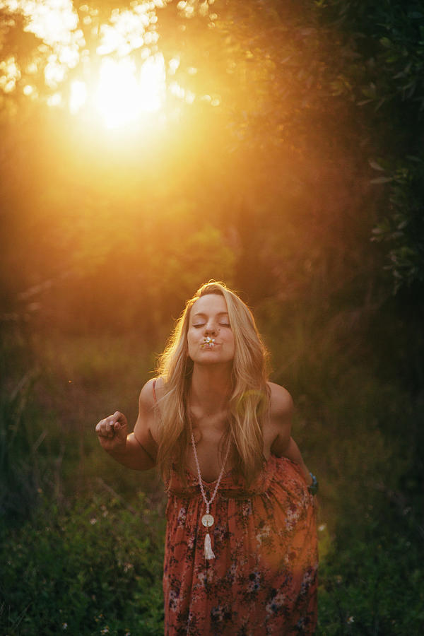 Young Woman Embracing Nature Around Her Photograph by Cavan Images 