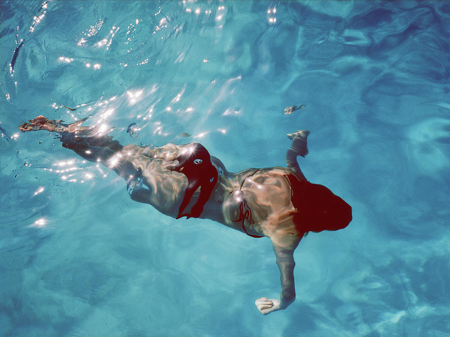Young Woman In Pool, Swimming Underwater Photograph by A.c.