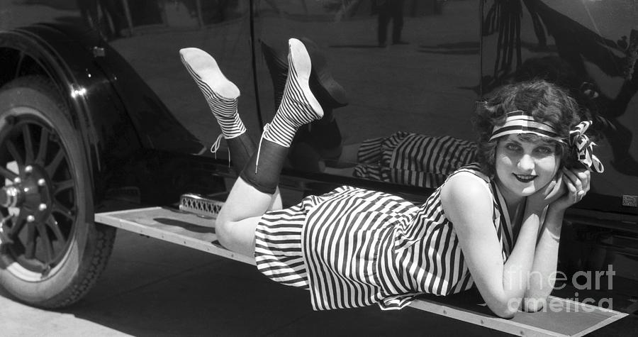 Young Woman In Striped Bathing Suit Photograph by Bettmann