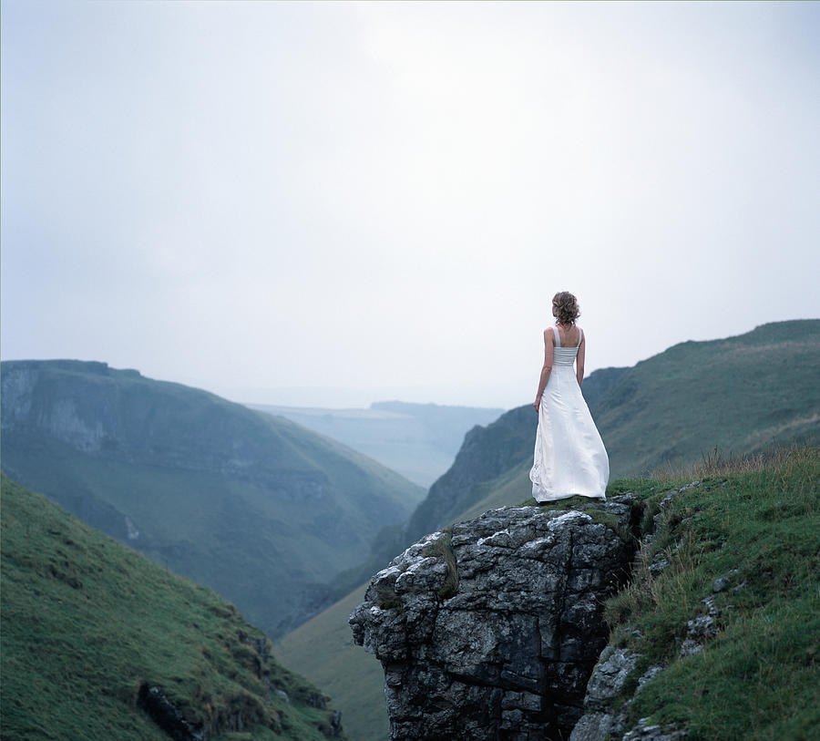 Young Woman In Wedding Dress Standing Photograph by Dougal Waters