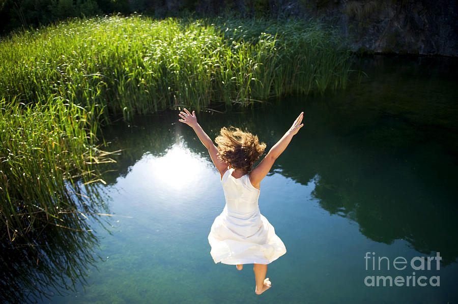 Bride Photograph - Young Woman In White Dress Jumping Into by Luna Vandoorne Bride Photograph - Young Woman In White Dress Jumping Into by Luna Vandoorne