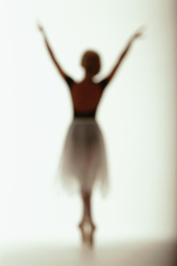 Young Woman Performing Ballet Silhouette Photograph by George Doyle