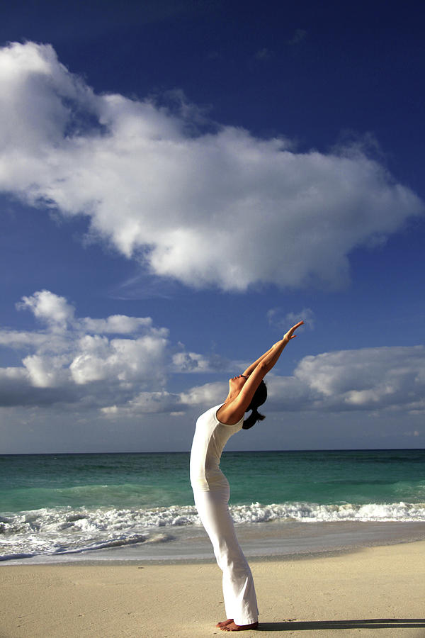 Young Woman Stretching On A Beach Photograph by Elke Selzle Young Woman Stretching On A Beach Photograph by Elke Selzle