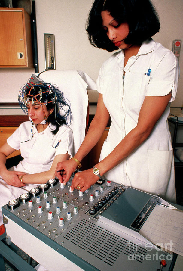 Young Woman Undergoing An Eeg Photograph by Jerry Mason/science Photo Library