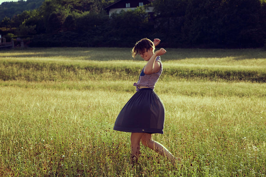 Nature Digital Art - Young Woman Walking Through Meadow by Manuela