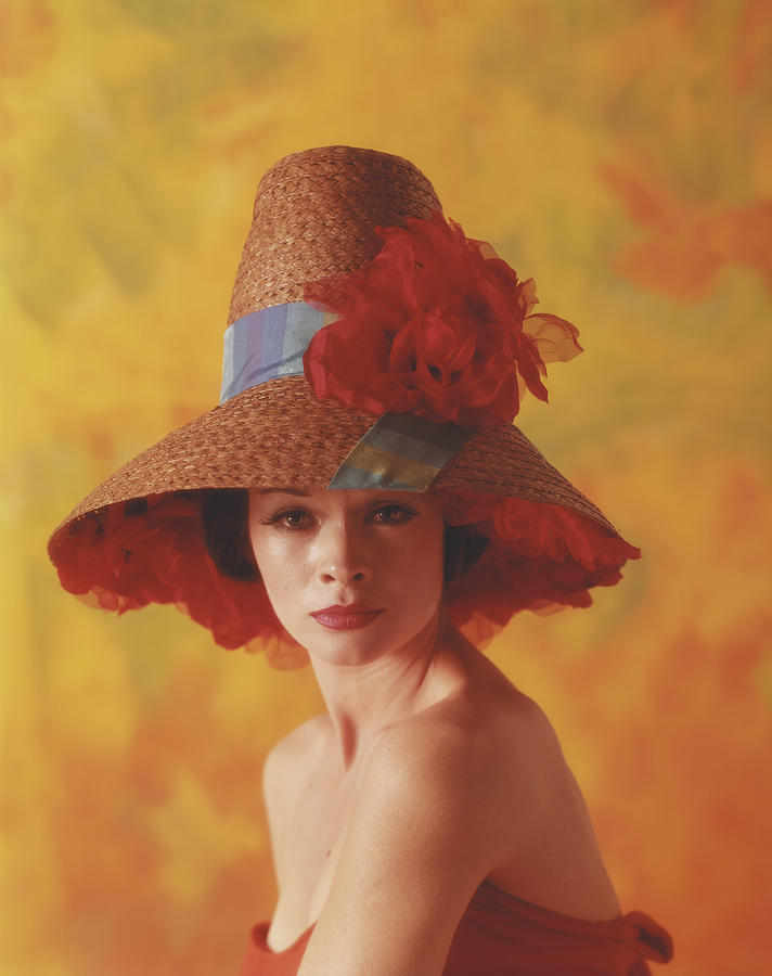 Young Woman Wearing Hat With Flower Photograph by Tom Kelley Archive