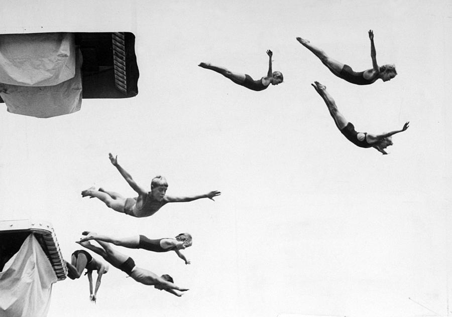 Youngsters Take Off In A Mass Dive In Photograph by New York Daily News Archive
