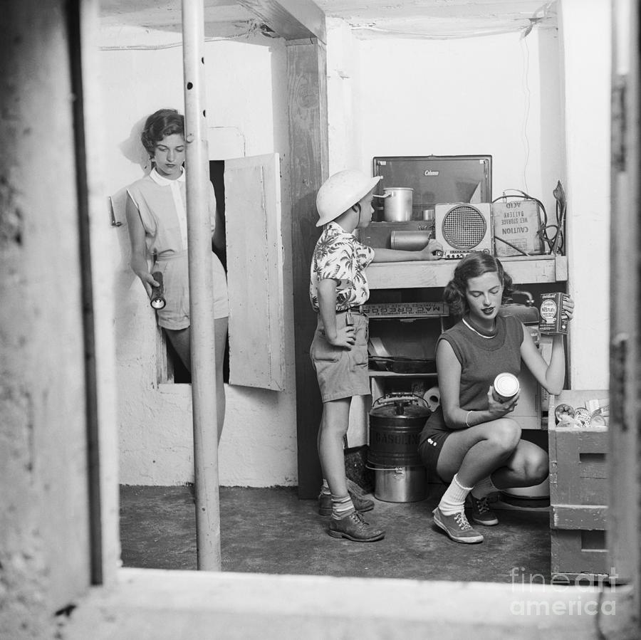 Youth Check Supplies In Fallout Shelter Photograph by Bettmann