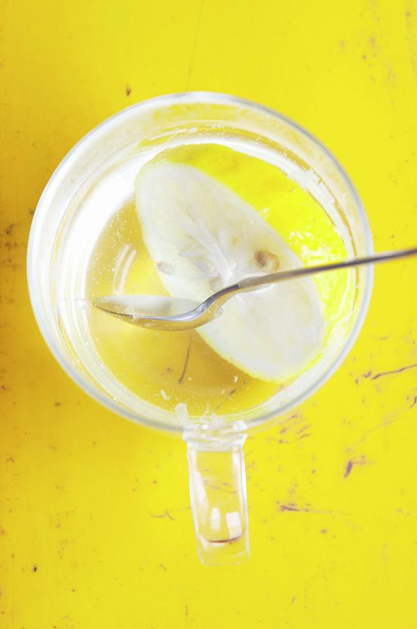Yuzu Tea In A Glas With A Spoon, Seen From Above Photograph by Martina Schindler