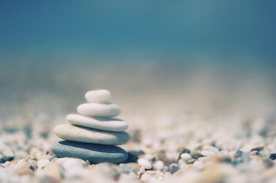 Zen Balanced Pebbles At Beach Photograph by Alexandre Fp