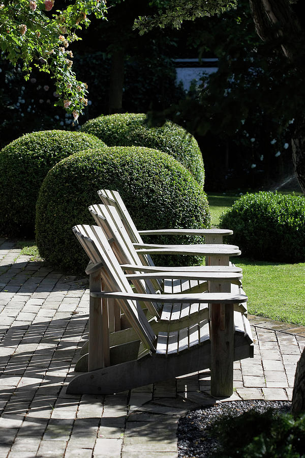 Ball Photograph - Zen Garden With Lounge Chairs And Boxwood Balls by House Of Pictures / Kennet Havgaard