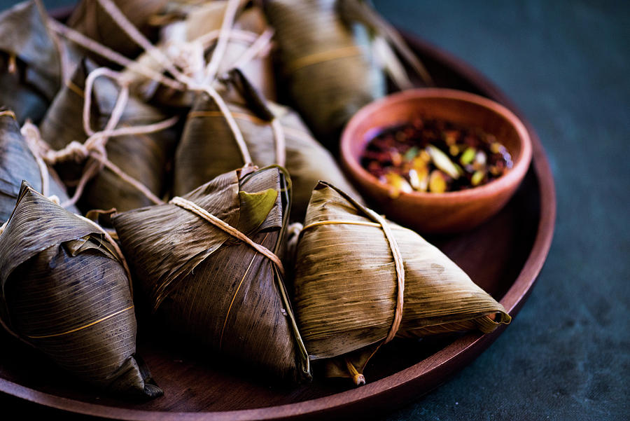 Zongzi sticky Rice In Bamboo Leaves, China Photograph by Hein Van Tonder