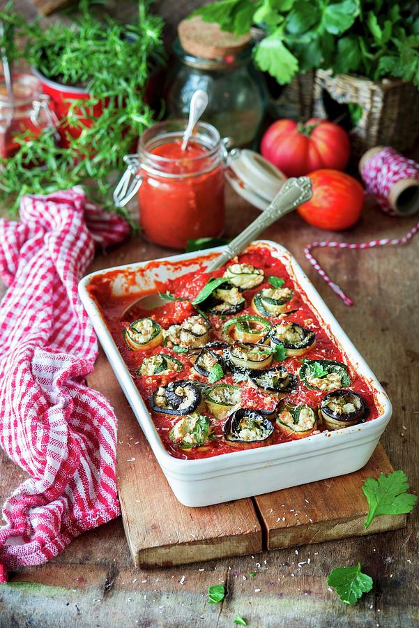 Zucchini And Eggplant Rolls Stuffed With Feta And Baked In Tomato Sauce Photograph by Irina Meliukh