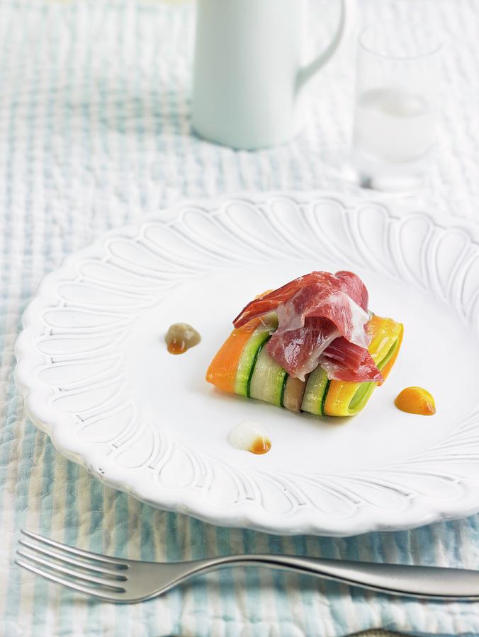 Zucchini, Carrot And Eggplant Ravioli With Ducks Ham Photograph by Lawton