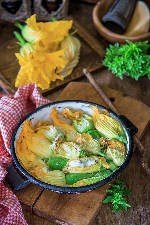 Zucchini Flowers Stuffed With Herbs And Cream Cheese And Baked Photograph by Irina Meliukh