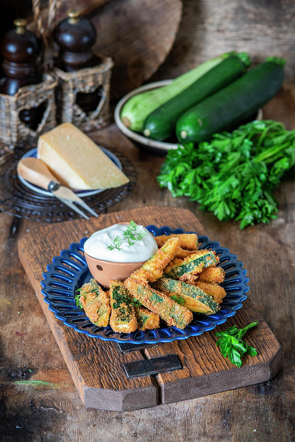 Zucchini Fritters With Sour Cream Photograph by Irina Meliukh