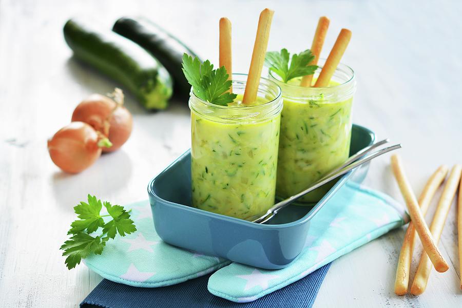 Zucchini Soup In Glasses With Grissini Photograph by Mariola Streim