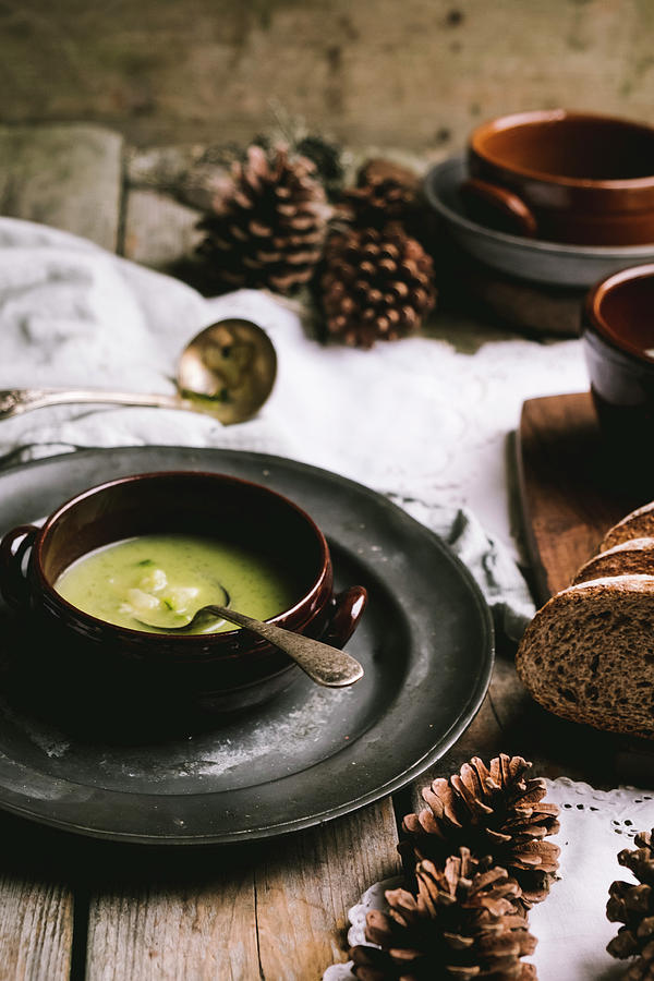 Zucchini Soup On A Wintery, Rustic Wooden Table Photograph by Lucie Beck