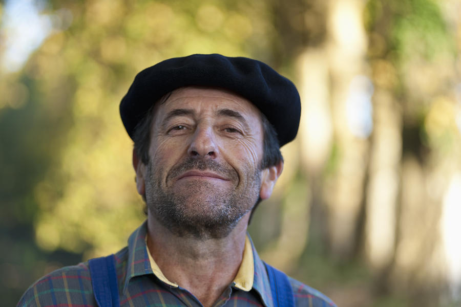  Frenchman wearing a beret. Photograph by Howard Kingsnorth