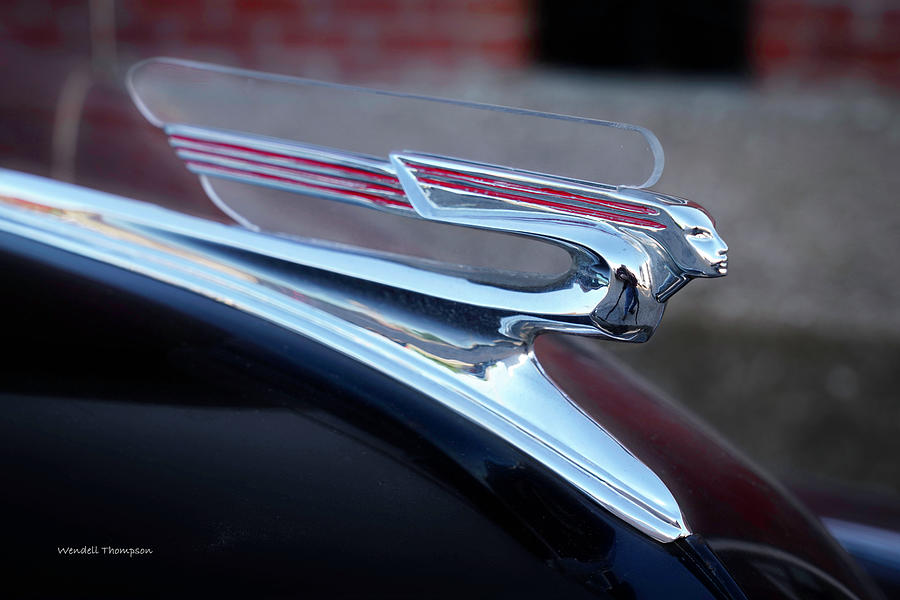1941 Chevy Super Deluxe Hood Ornament Photograph by Wendell Thompson